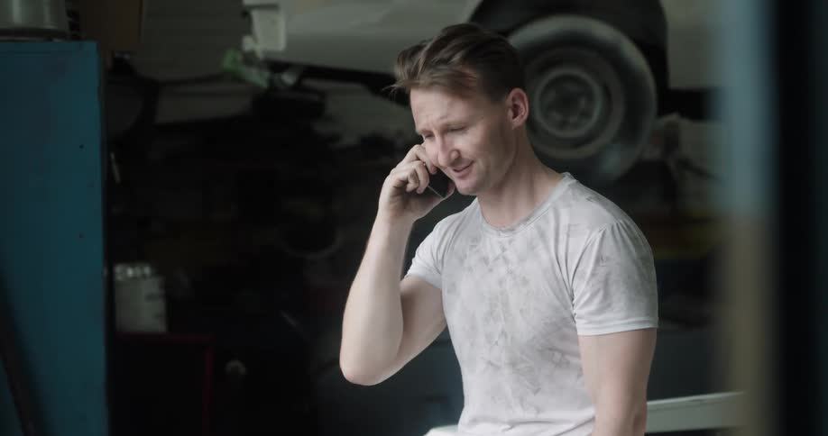 A man is talking on a cellphone