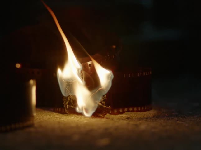 35mm film burning on ground