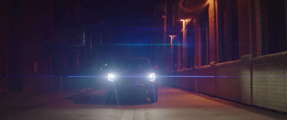 A vehicle driving down a street