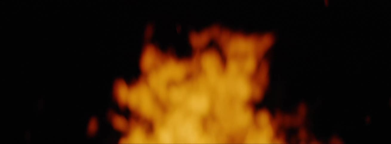 Flames burning in a fire at night
