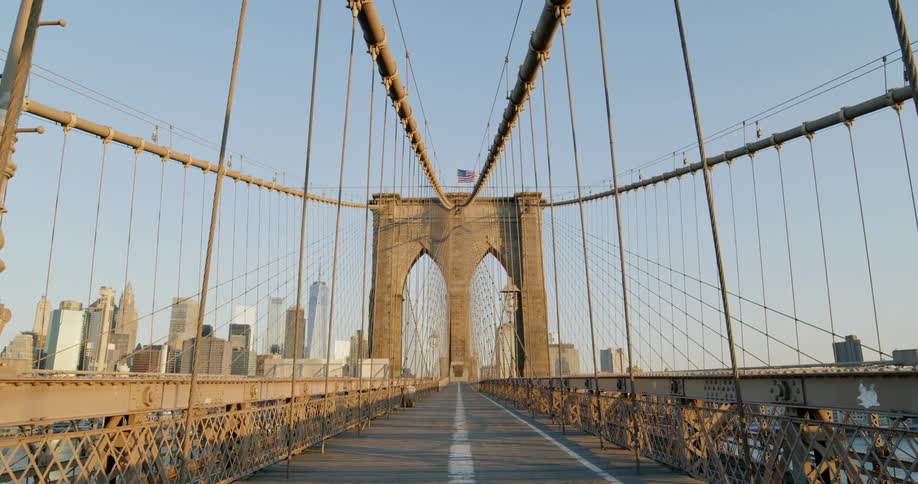 A bridge is displayed by a downtown city