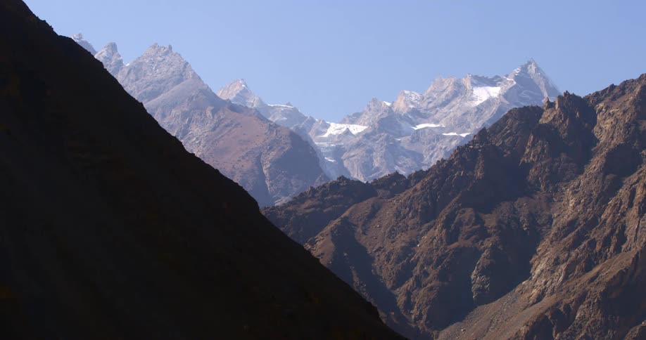 An aerial view of a mountain is displayed