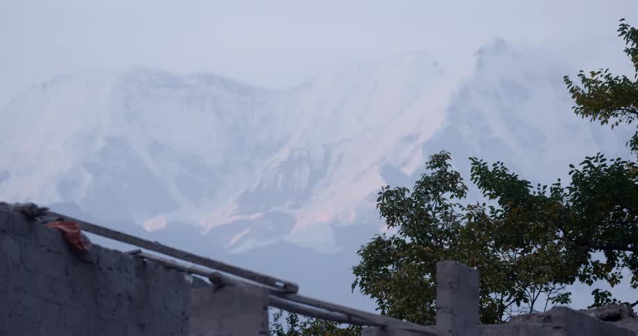 A mountain is displayed in the distance