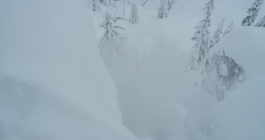A person snowboarding down a mountain
