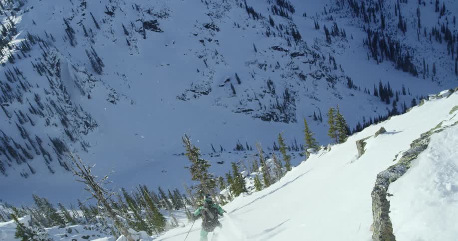 A person skiing down a mountain