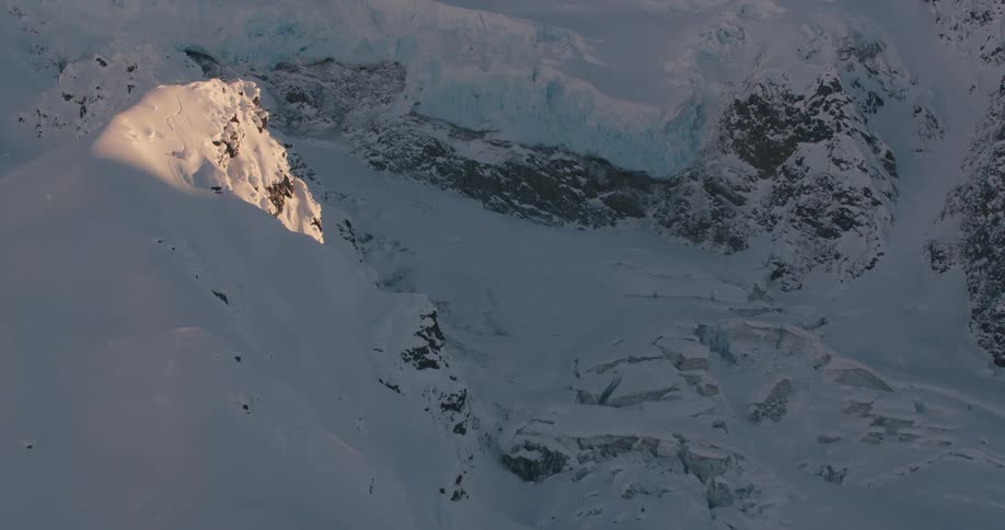 A mountain is covered in snow