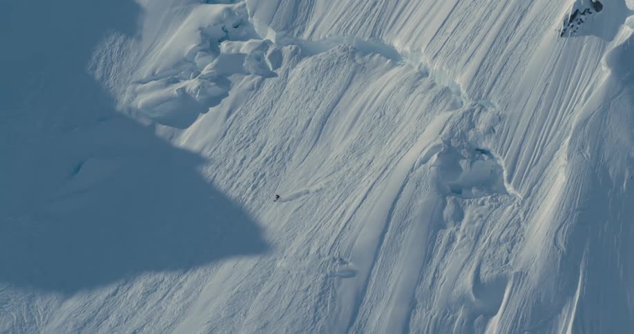 A person skiing down a mountain