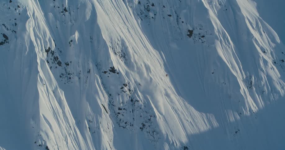 A person skiing down a mountain