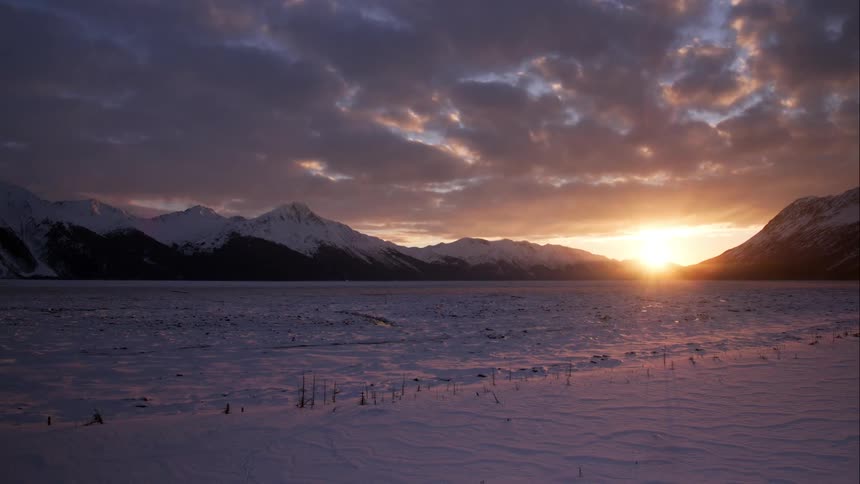 Aerial descent over a stunning arctic area at sunset