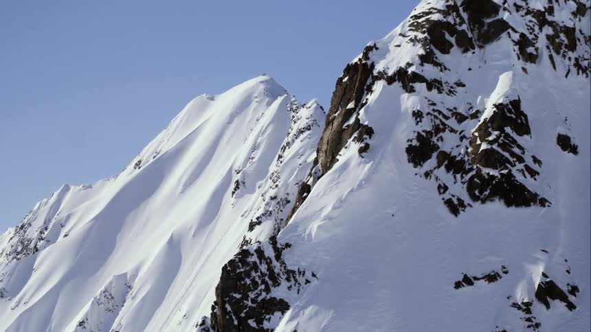 Aerial movement through stunning huge mountains