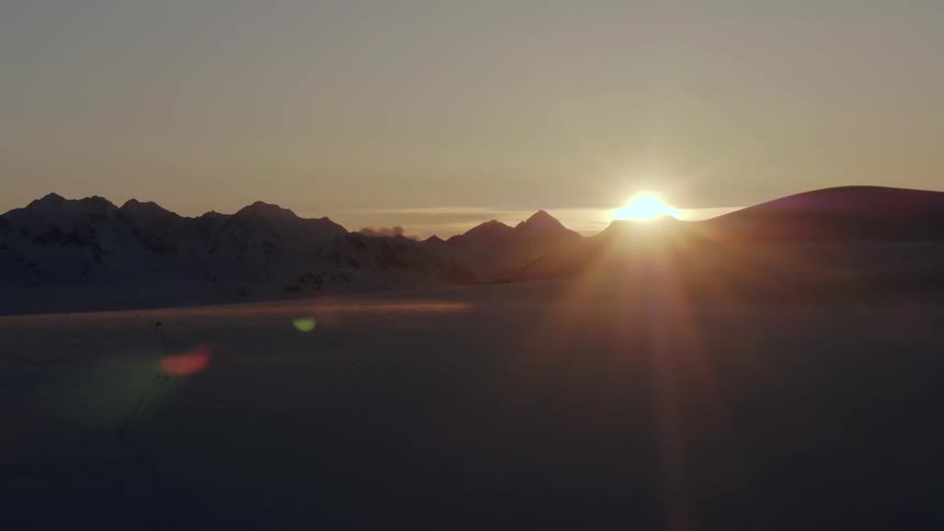 Aerial of sunset over a massive glacier
