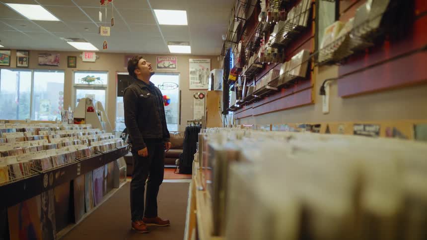 A man shopping in a record store
