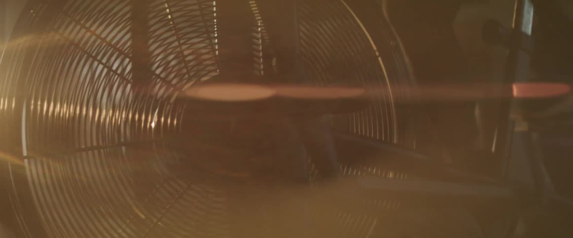 A person is exercising on a bike indoors