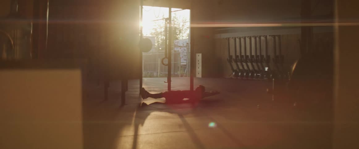 A man is working out in a gym
