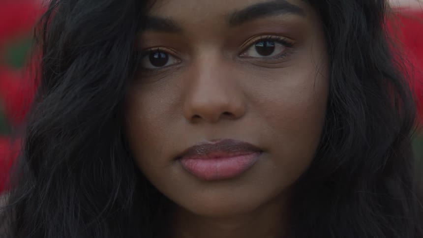 A woman is standing outside