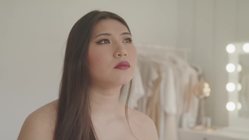 A teenage girl in a dressing room