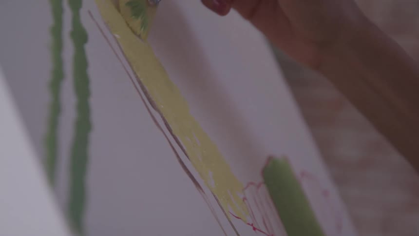 A woman painting a picture