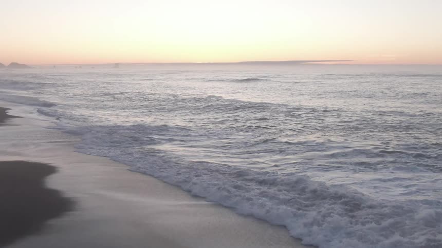Waves rolling in to the shore