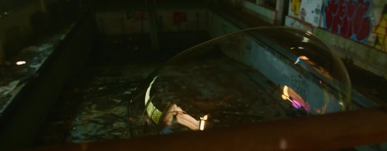 A bubble floating and bursting in a building