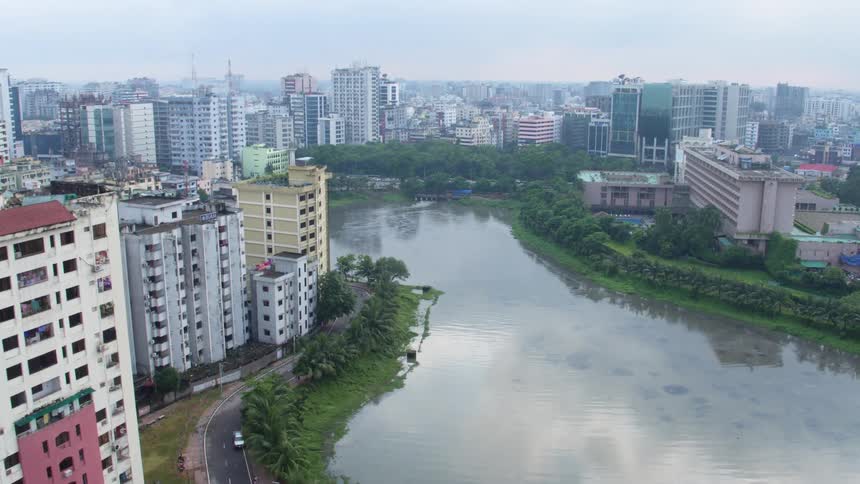 Aerial view of a lake in the middle of a city