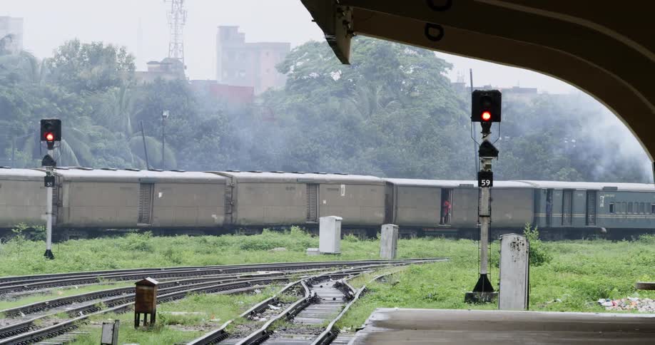 Train on tracks and train station