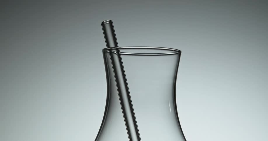 The lights turn on showing a large vase