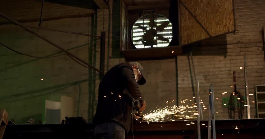 A man welding in a shop
