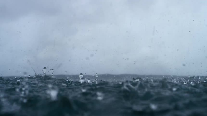 Rain falling on the ocean