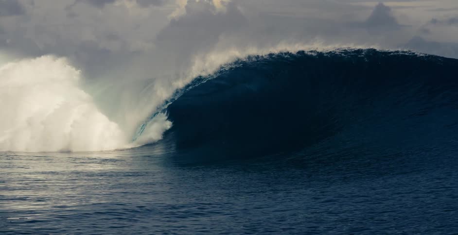 Teahupoo wave barreling crashing into ocean