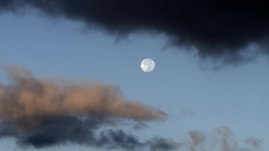 dramatic moon shot with clouds