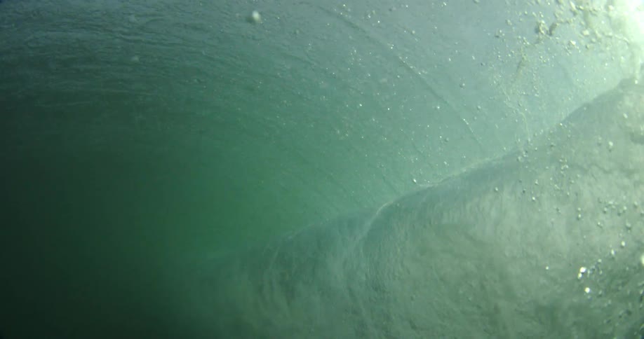 Wave crashes over camera