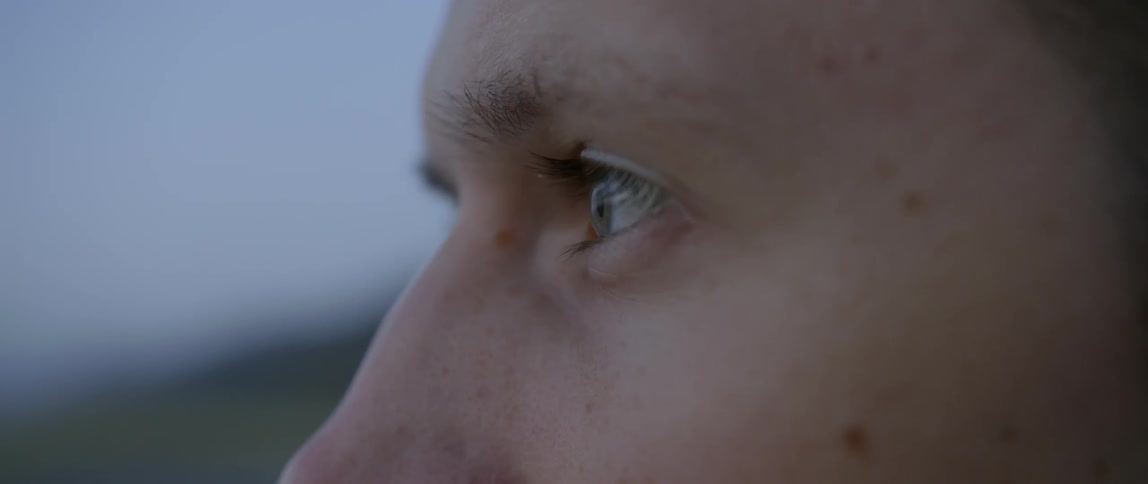 Close up of a man's eyes looking back and forth