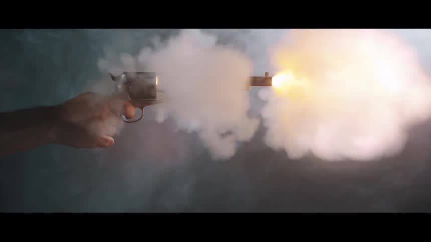 A person fires a vintage revolver