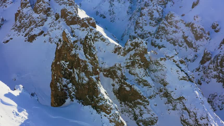 Snow covered jagged mountain range