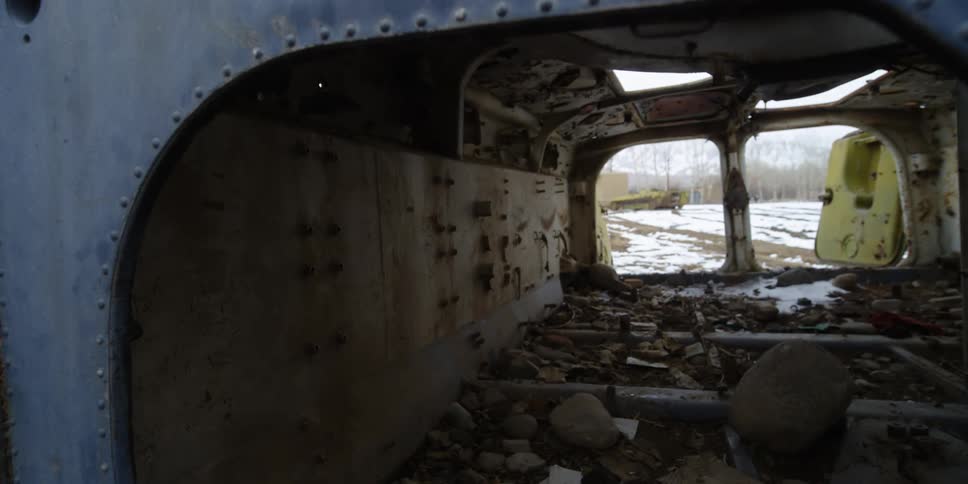 Abandoned military vehicle in snow
