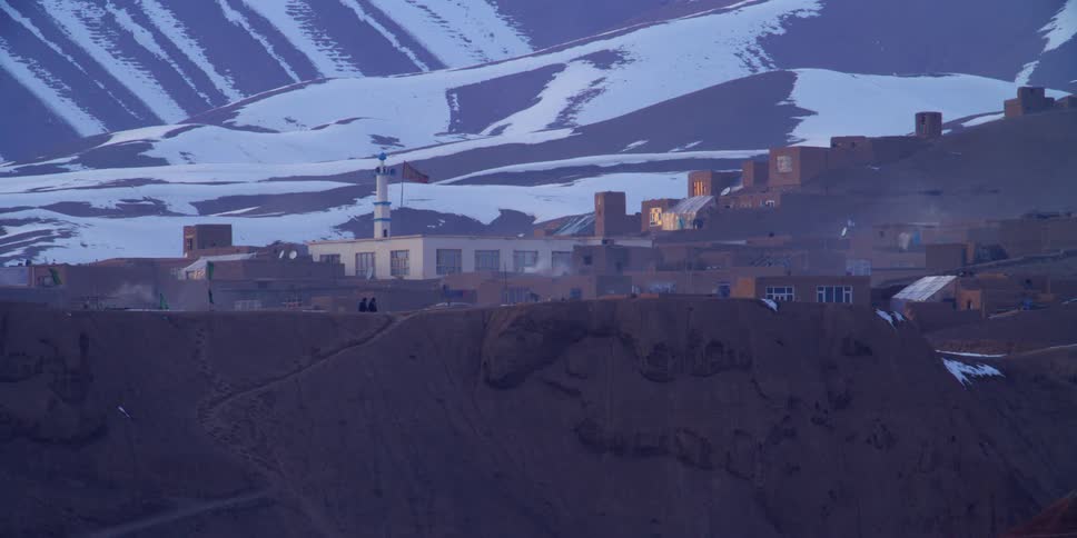 The small town is near the mountain