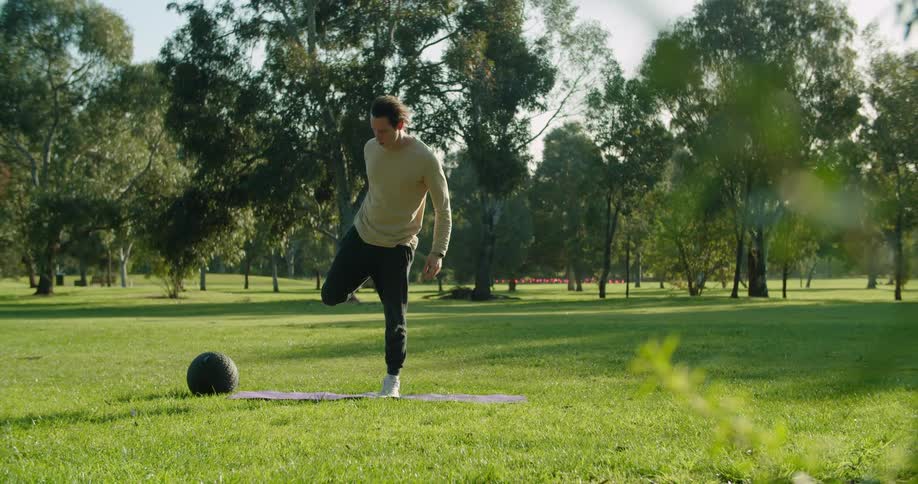 A man stretches before exercising