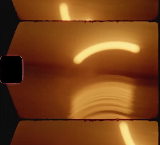 A light filament vibrates wildly