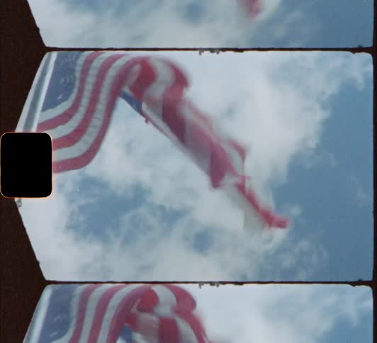 Wind blowing through an american flag in the daytime 8mm