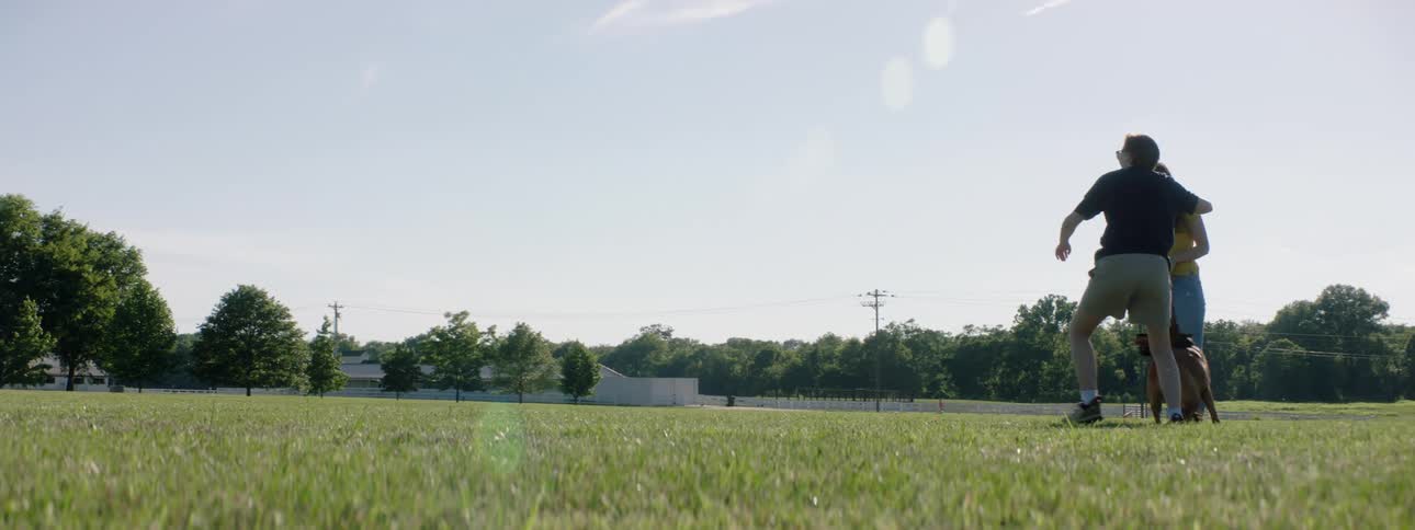 People play fetch with their dog