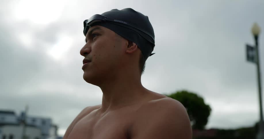 A swimmer stretching before swimming