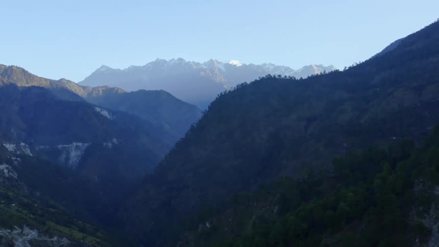 Aerial view of high mountains with a valley