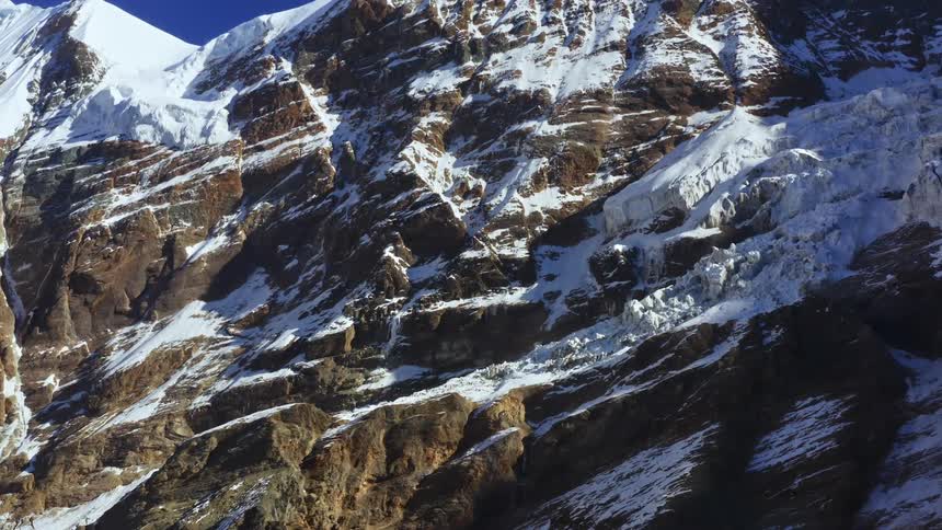 Aerial view of mountains are displayed
