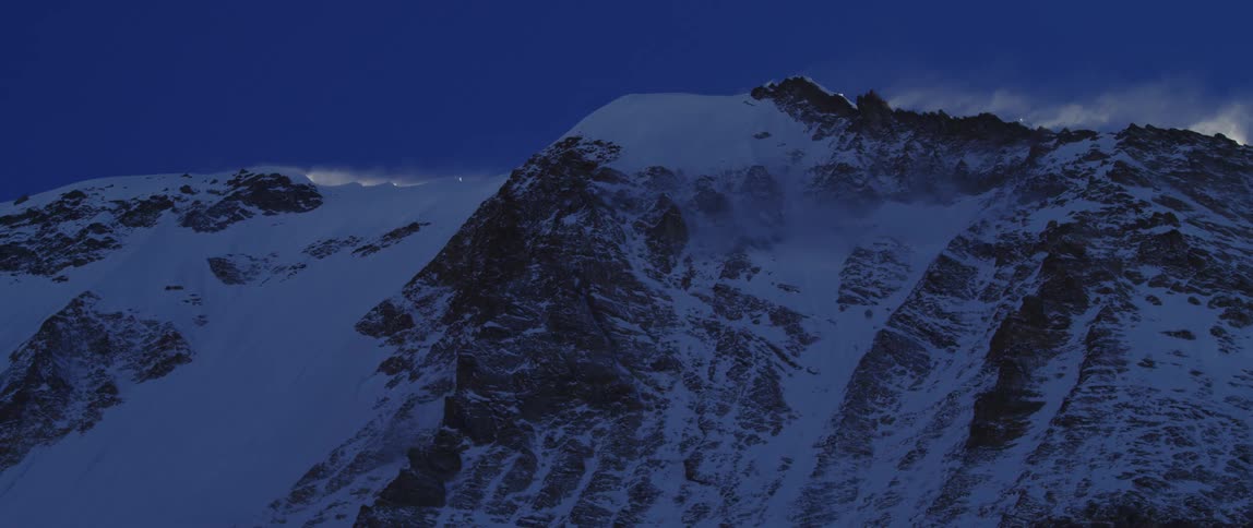 A mountain range covered in snow