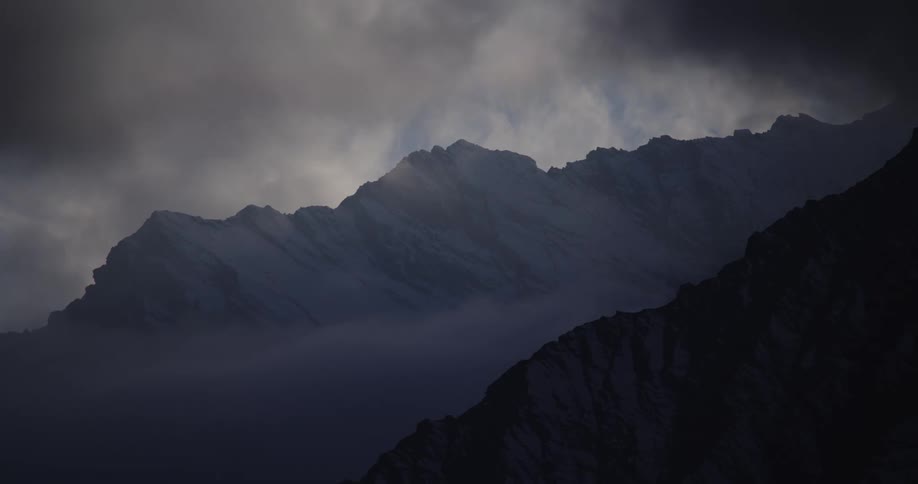 View of mountain ranges in the fog