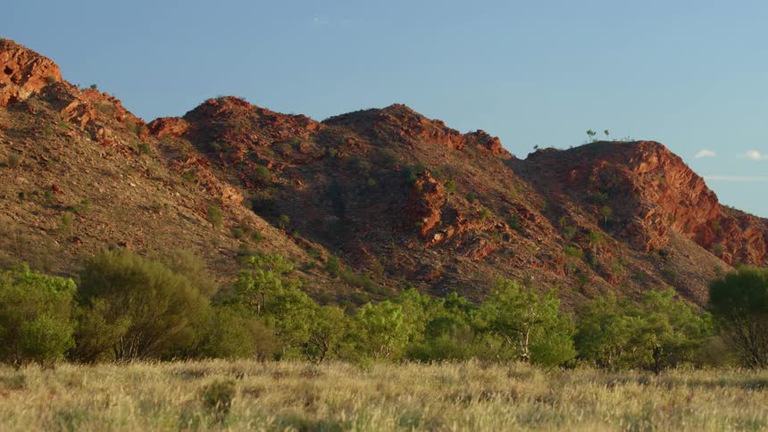 Rocky hills and trees in nature on a summer day