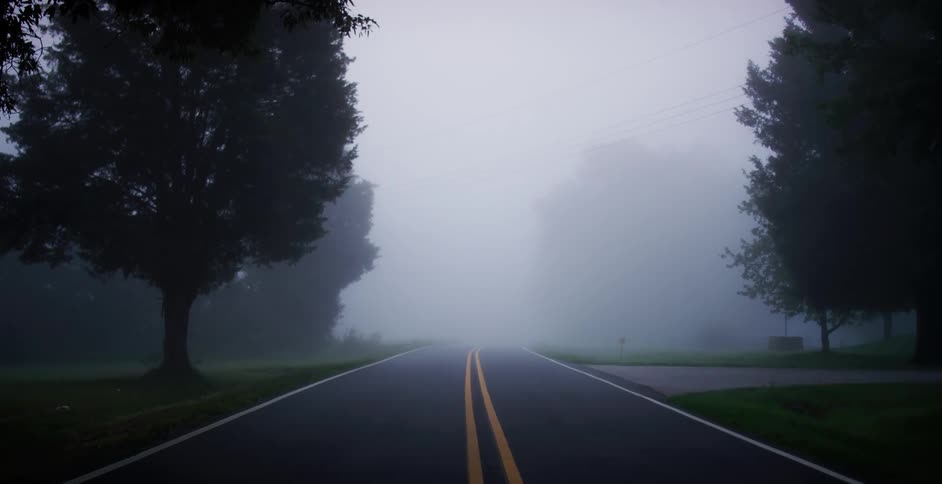 An empty road is displayed during the day