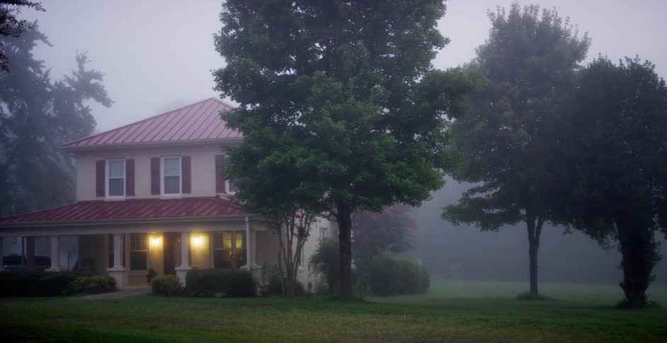 A view of a house with it raining
