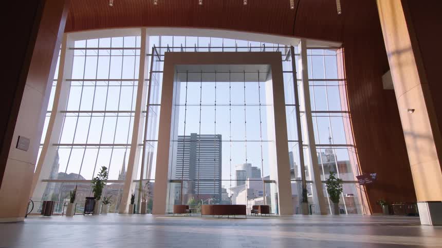 An empty room with a large window