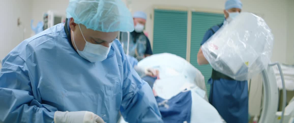 Medical team prepares in surgical room